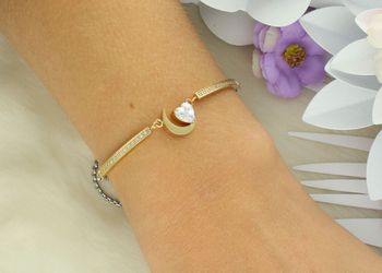 Oryginalna bransoletka Nomination Italy Milleluci 028021 038 z zawieszką księżyca i serca, zdobiona cyrkoniami. Złocona stal szlachetna, regulowana długość, certyfikat autentyczności (2).jpg